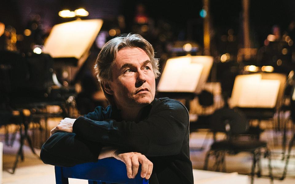 Esa-Pekka Salonen sitting on a chair