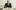 Philippe Herreweghe, credit Michiel Hendryckx Conductor Philippe Herreweghe, sitting at a table with a pencil in his hand, going over a score