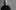 James Newton Howard Conductor James Newton Howard holding a baton, wearing glasses and a black turtleneck