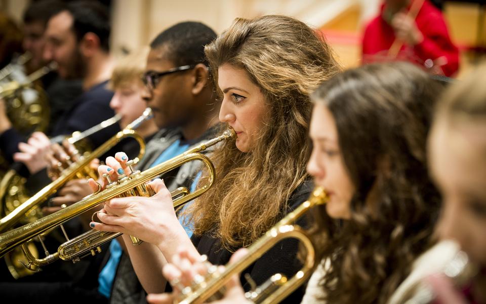 Young trumpet players on stage together