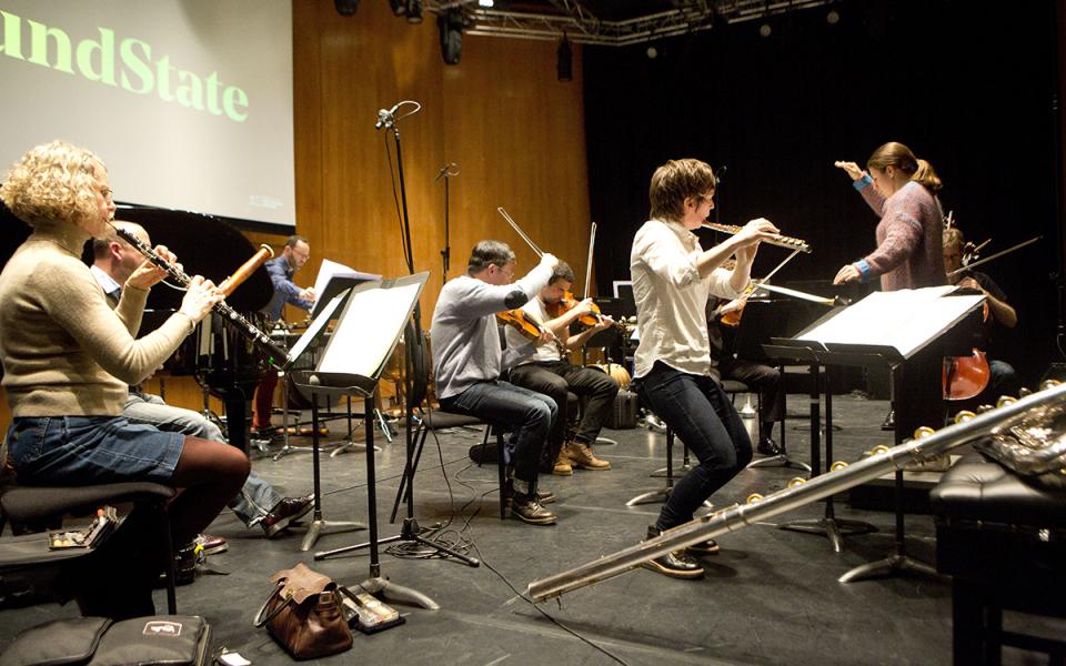 Photo of flautist Claire Chase with the Philharmonia