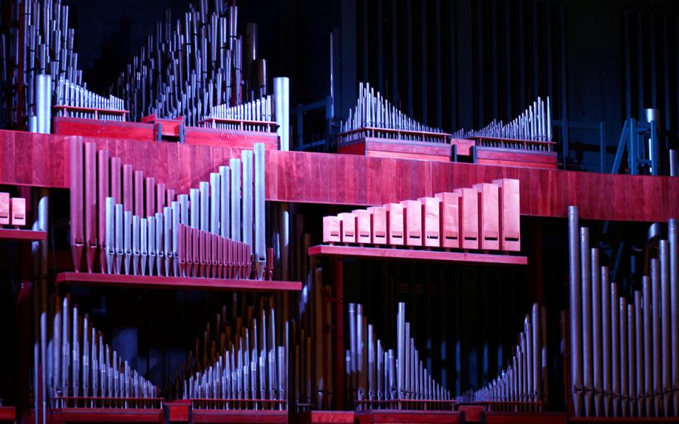 The organ at Royal Festival Hall under pink and purple lighting