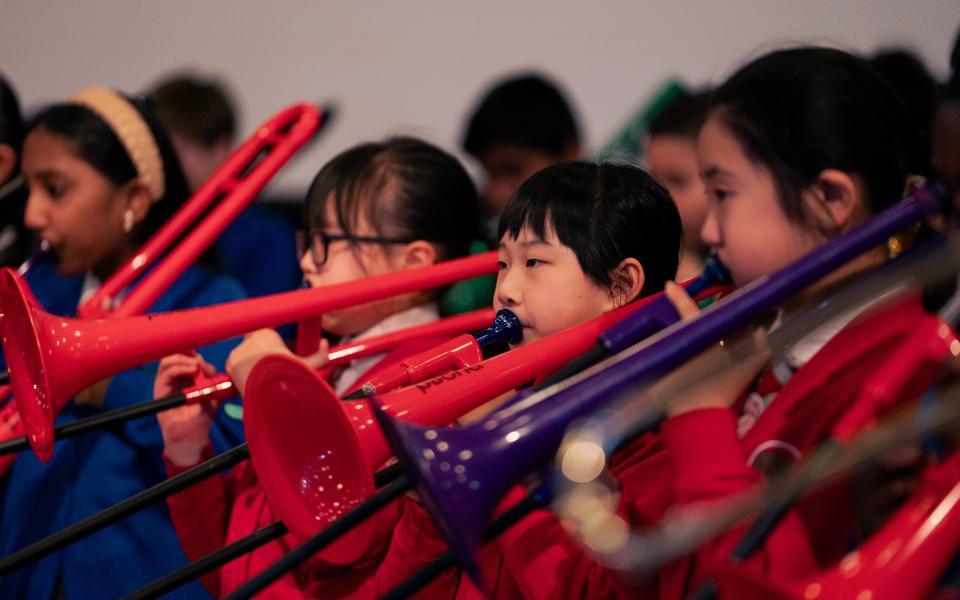 © Matthew Johnson Photographer-4 School kids playing plastic trumpets