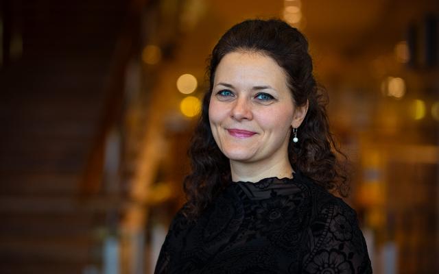 Emanuela Buta smiling at camera in Royal Festival Hall