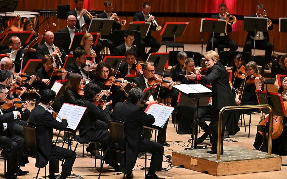 Marin Alsop stands at the podium of the Philharmonia Orchestra