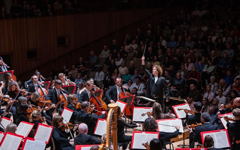 Wide image of Santtu-Matias Rouvali conducting the Philharmonia at Royal Festival Hall